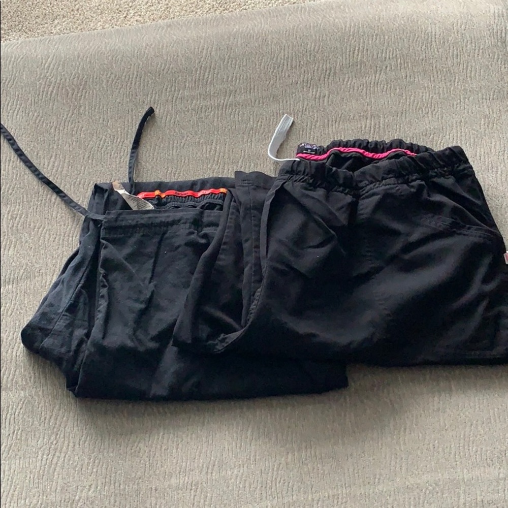2 pairs of black scrub pants